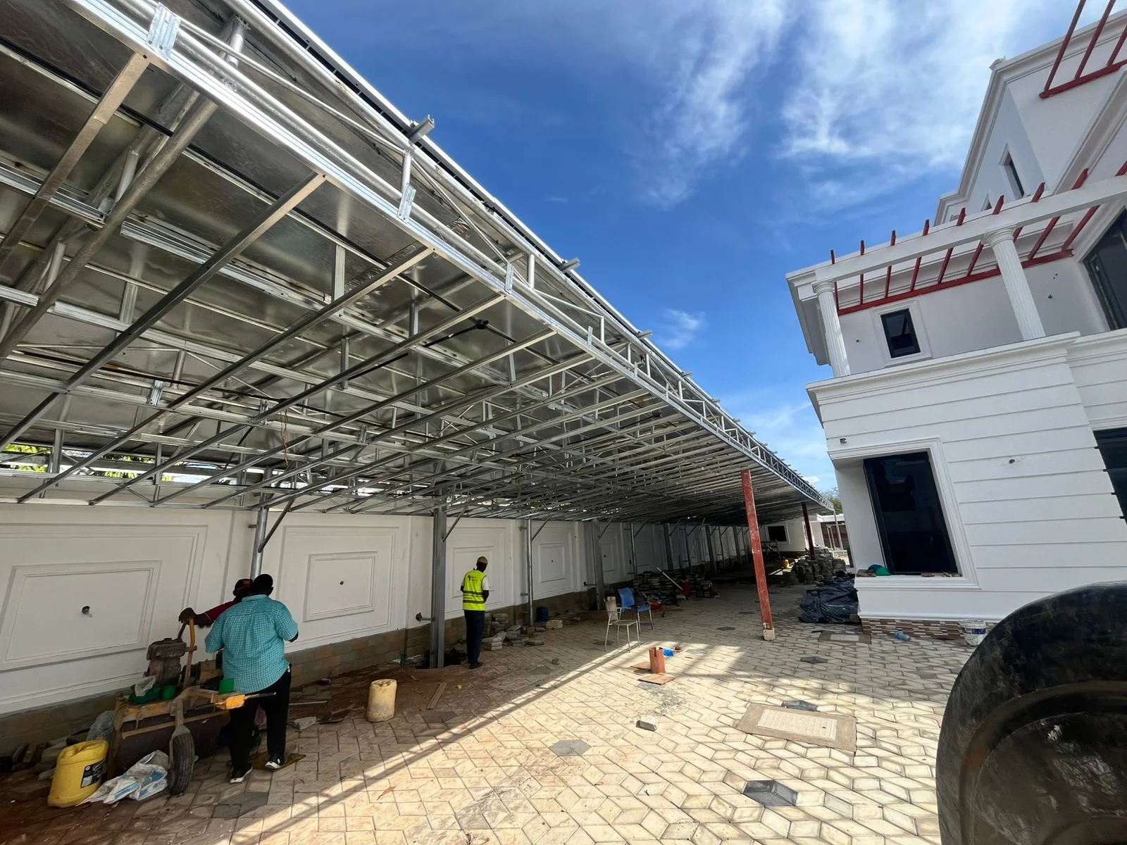 Large-scale custom solar carport structure under construction, Mombasa